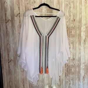 White sheer blouse with tassels